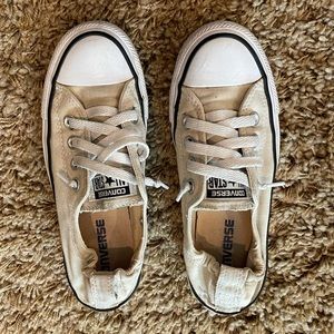 Converse, slip on laced shoes